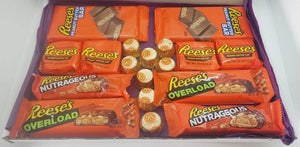A Large Reese's Chocolate Letterbox Gift with various Reese's chocolate bars, beautifully packaged in a tissue-lined box.